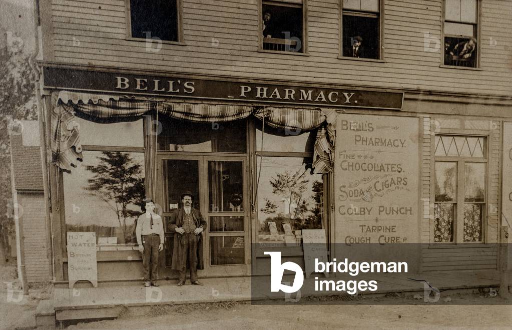 Two Men Pose in Front of Bell’s Pharmacy, c.1895 (silver gelatin print)