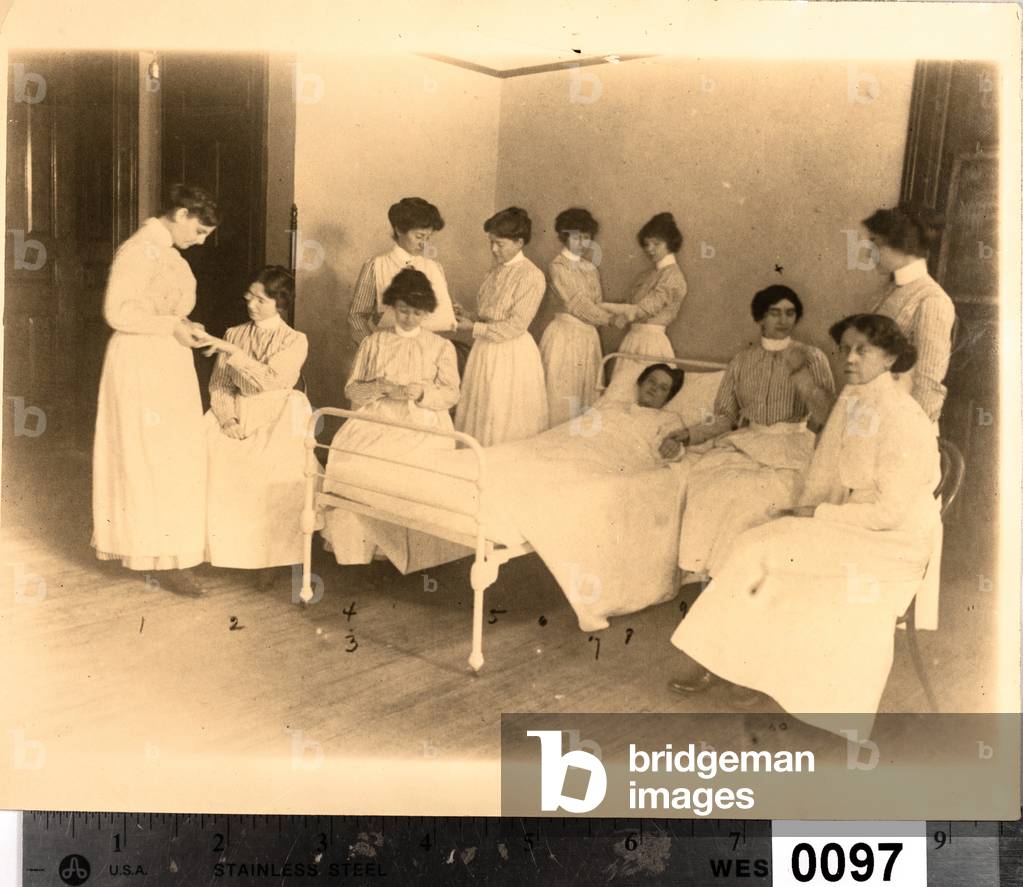 Nurses Attending to a Patient (silver gelatin print)