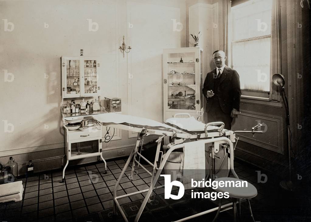 Doctor in Office Operating Room, c.1910 (silver gelatin print)