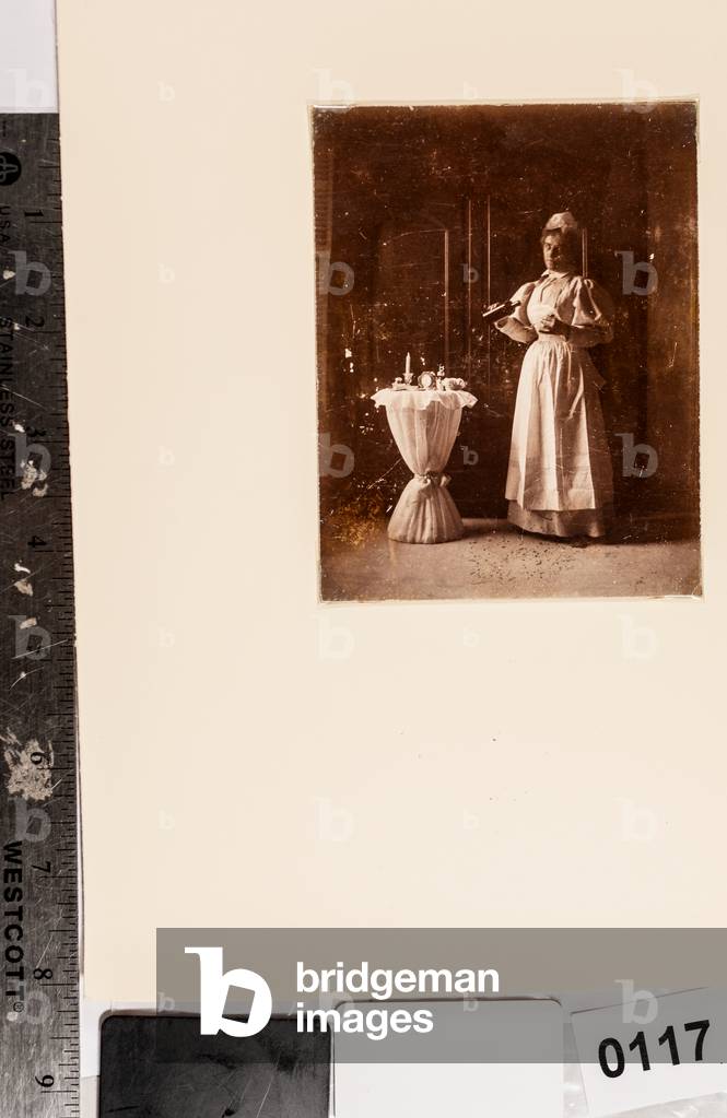 Portrait of Nurse Dispensing Medicine, c.1890 (albumen print)