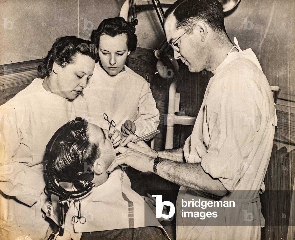 WWII Women’s Army Core Dental Assistants with Doctor and Patient, c.1944 (silver gelatin print)