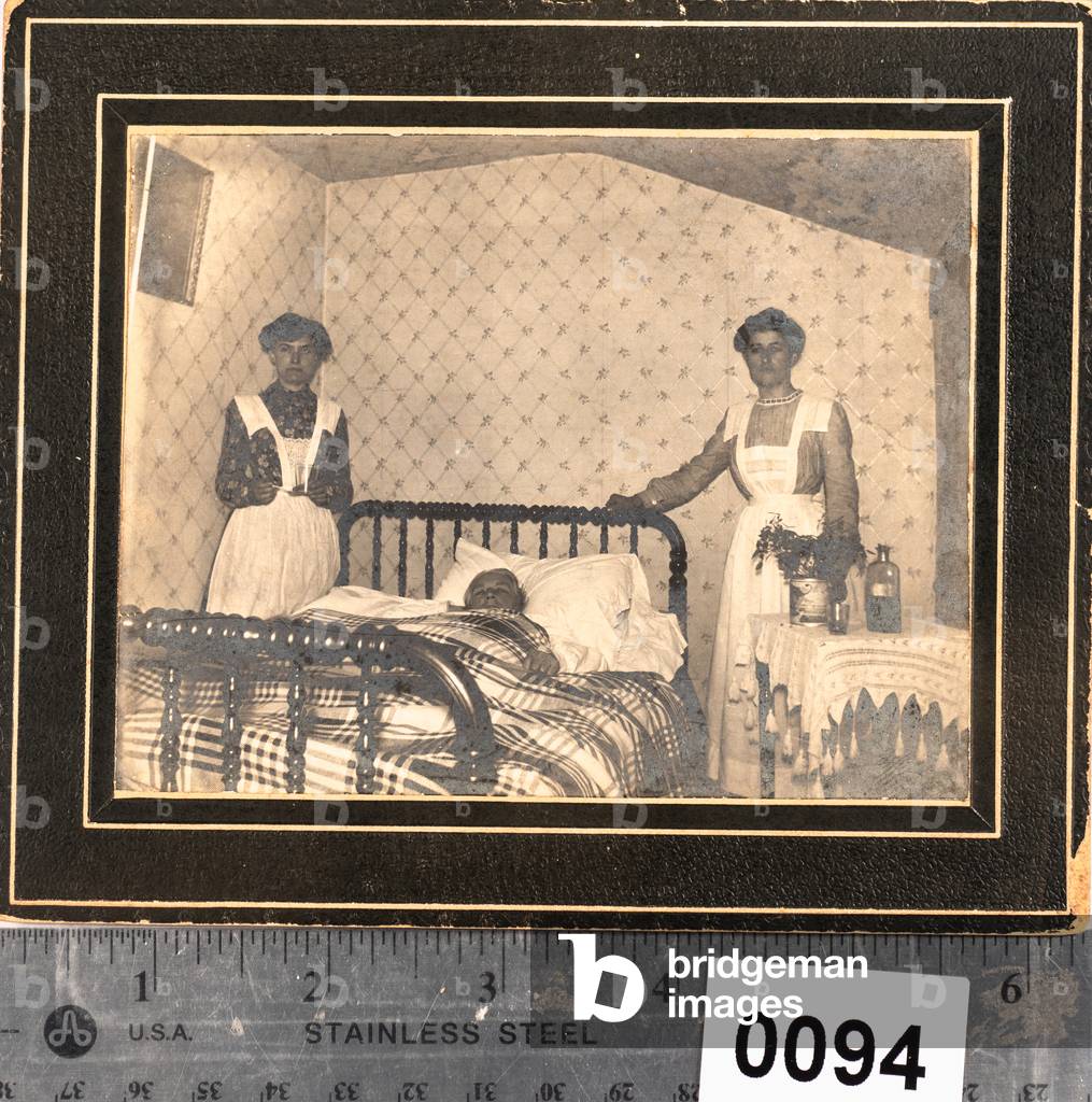 Nurses with Male Patient  (silver gelatin print)