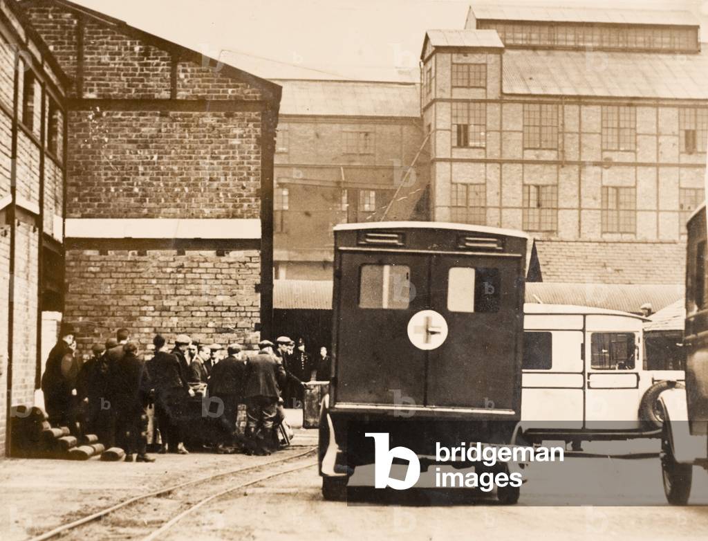 Ambulance in Urban Setting with Crowd, England, c.1920 (silver gelatin print)