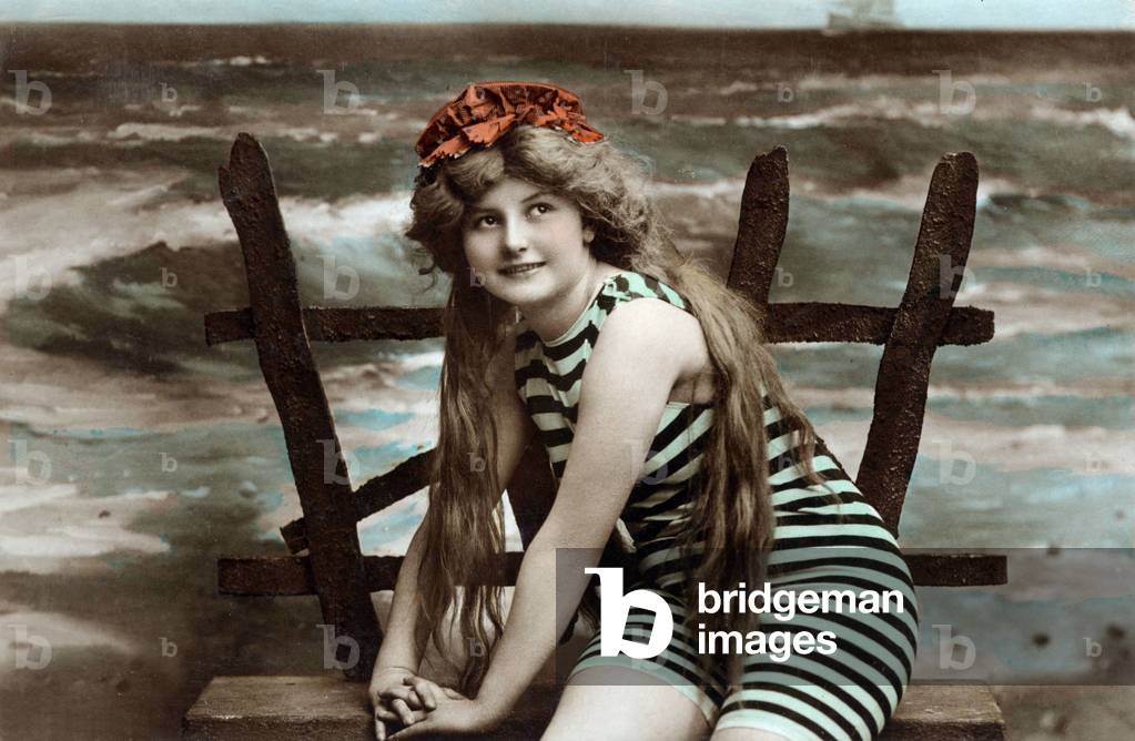 A young woman near sea, postcard, c. 1910