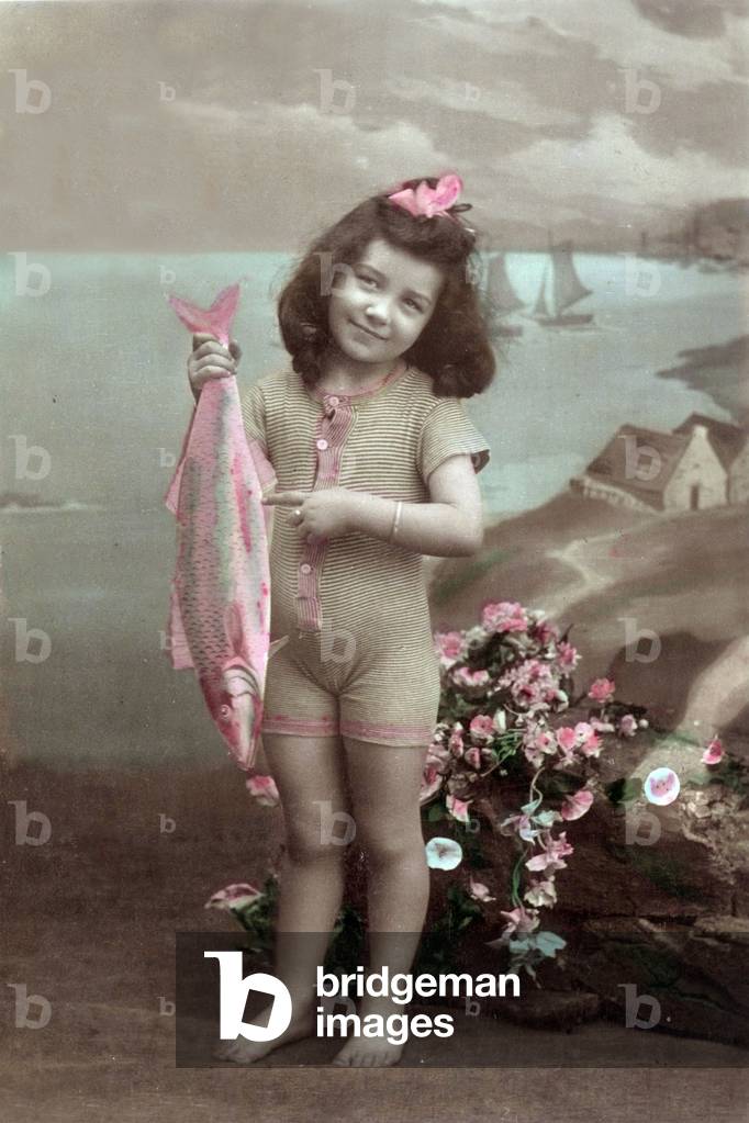 A little girl coming back from fishing with a big fish, postcard, c. 1910