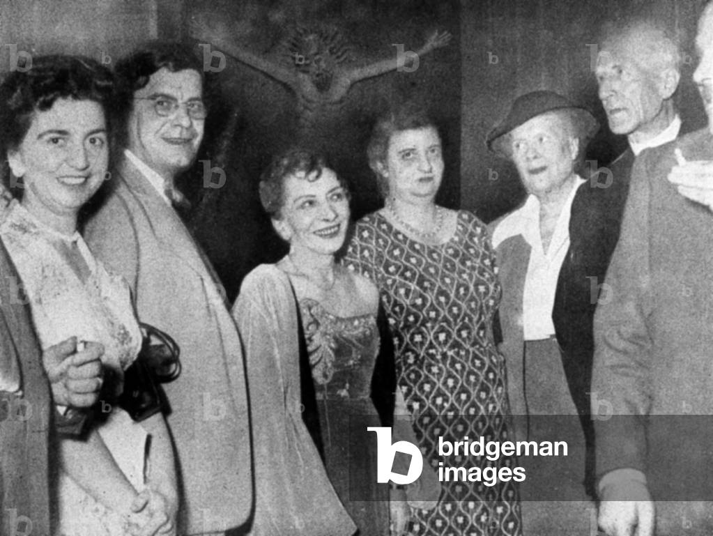 reception of father Pierre Teilhard de Chardin at Psyche's on july 10, 1954: l-r: Alba Canali, Jacques Lacan, Maryse Choisy, Rhoda de Terra, Louise Weiss, Pierre Teilhard de Chardin and professor Hippolyte