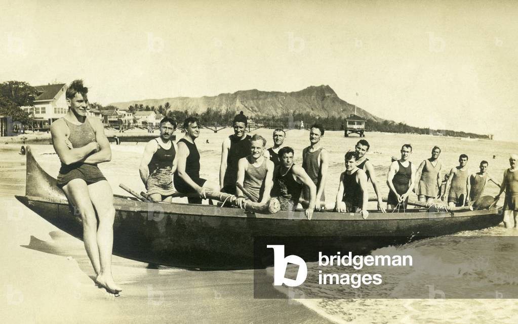 A canoe team at Waikiki Beach, c.1920s (b/w photo)