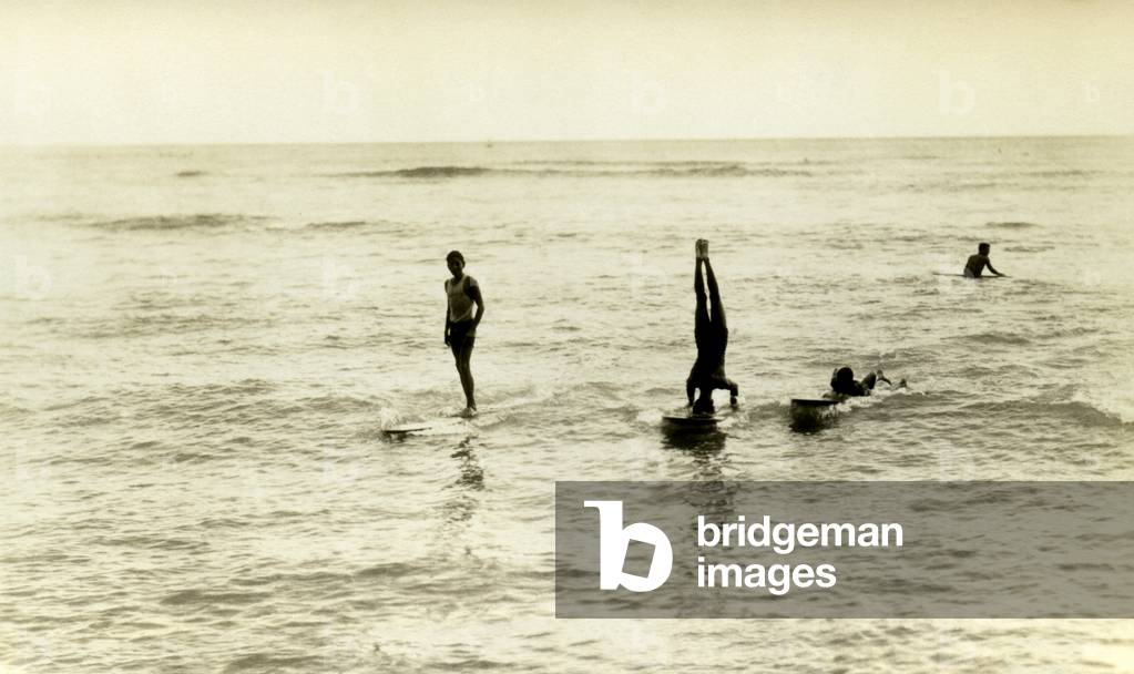 Surfers at Waikiki Beach (b/w photo)