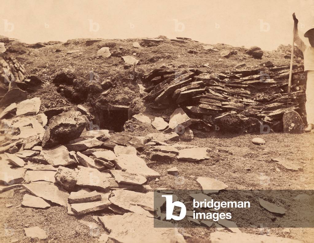 Digging graves and ruins on Easter Island (sepia photo)