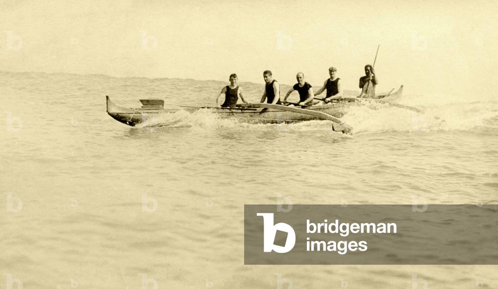An outrigger canoe and its crew (b/w photo)