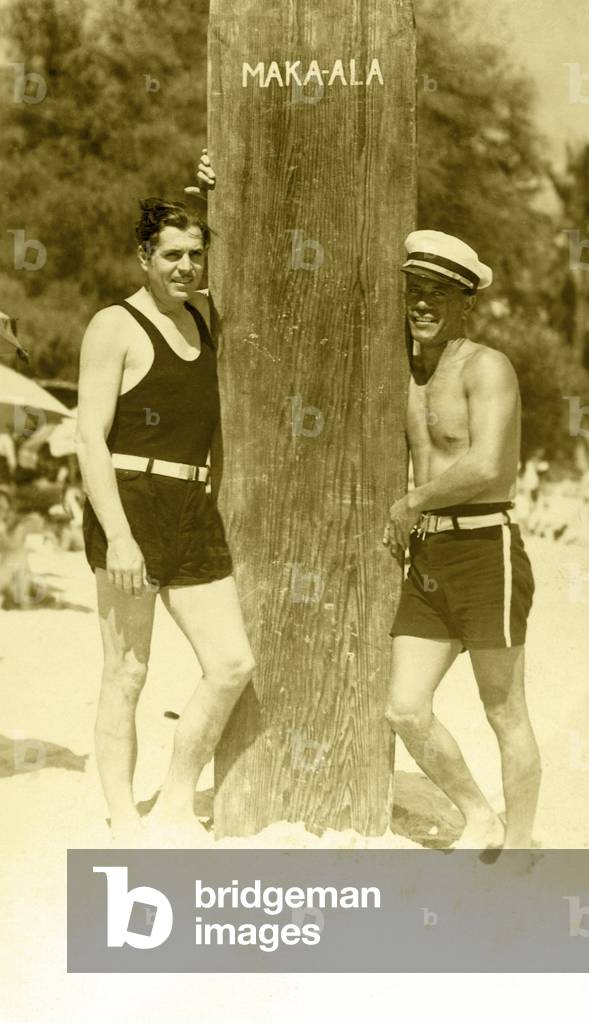 Warner Baxter and the Cisco Kid, with longboard, c.1920s (b/w photo)
