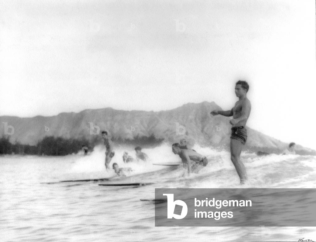 Surfers at Waikiki beach, entitled 