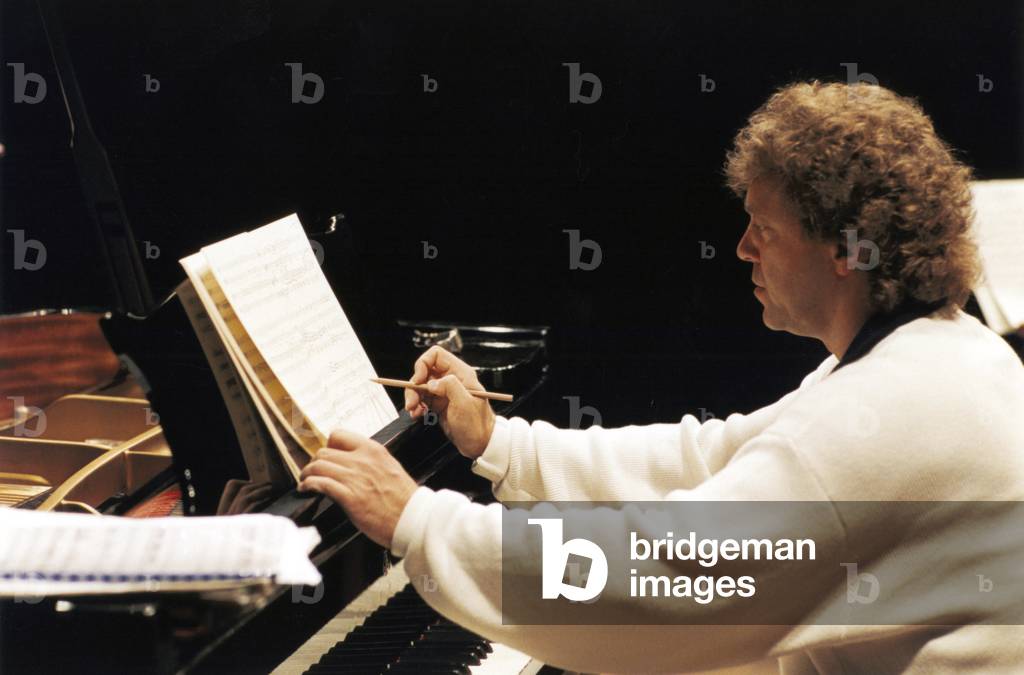 Pascal Roge seated at piano during rehearsal at Snape , 1999