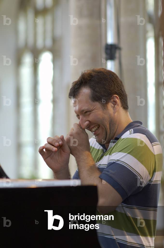 Thomas Adès - British composer, conductor and pianist rehearsing at the Blythburgh church, Aldeburgh Music Festival, Suffolk, UK, June 2007