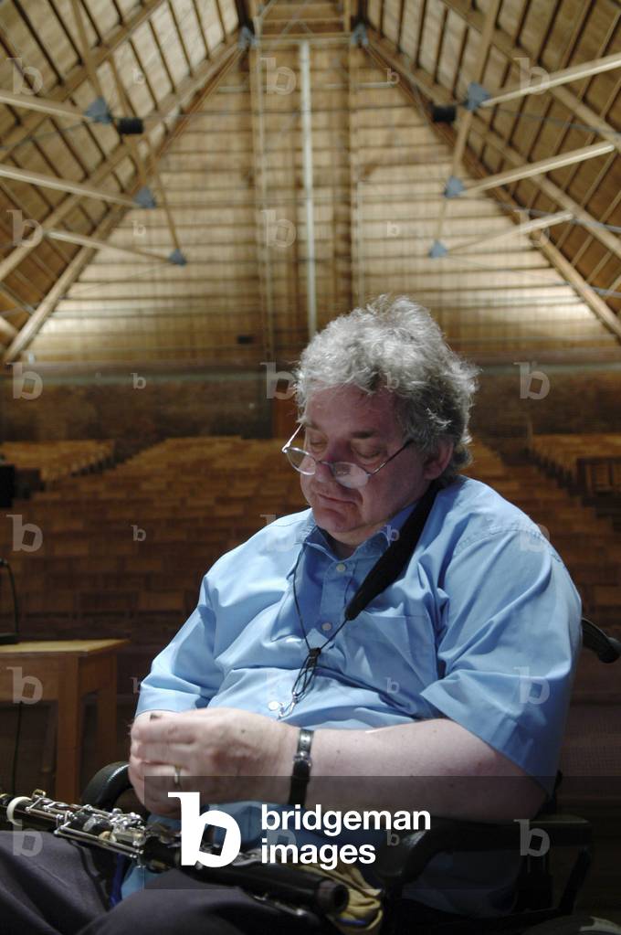 Alan Hacker sitting with clarinet, Aldeburgh Festival, Snape, England, 2004