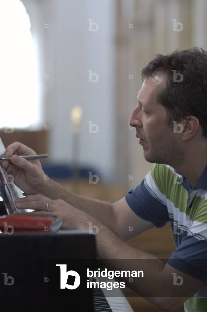 Thomas Adès - British composer, conductor and pianist rehearsing at the Blythburgh church, Aldeburgh Music Festival, Suffolk, UK, June 2007