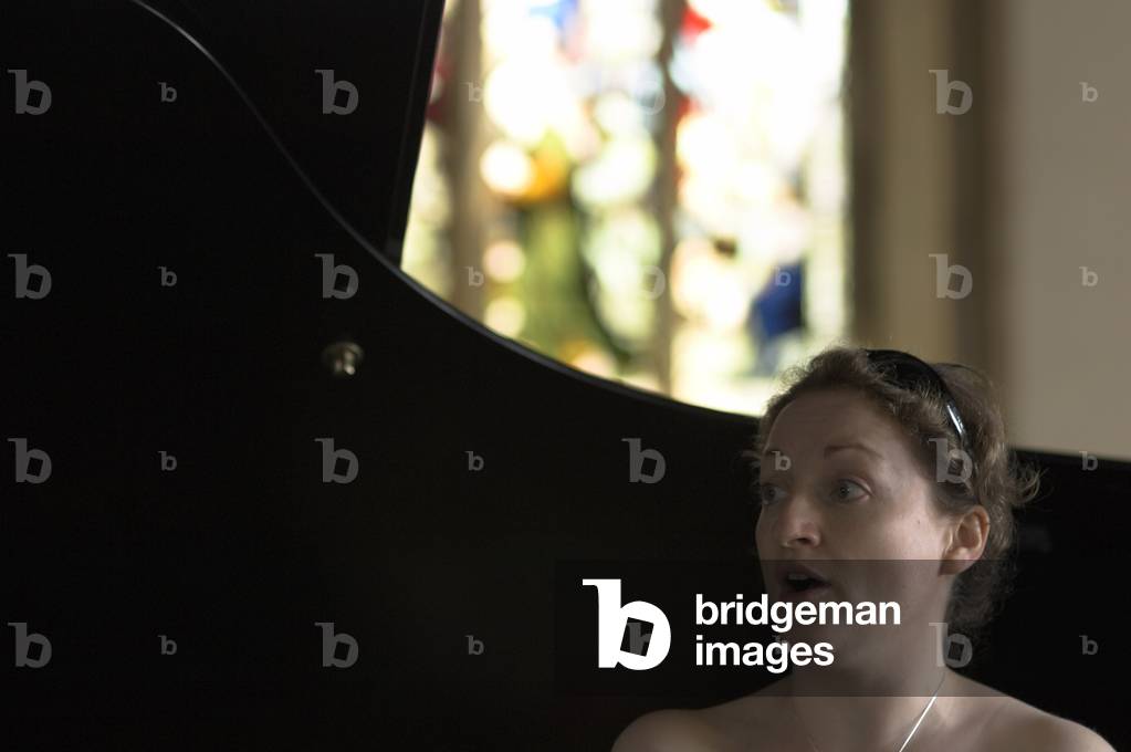 Ailish Tynan - portrait of the Irish soprano at Aldeburgh Parish Church in front of a stainded glass window during the Aldeburgh Festival, June 2005