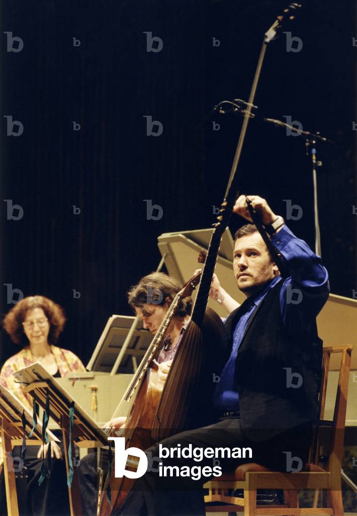 NORTH, Nigel - tuning THEORBO, 1999 during rehearsal at Snape English Lutenist