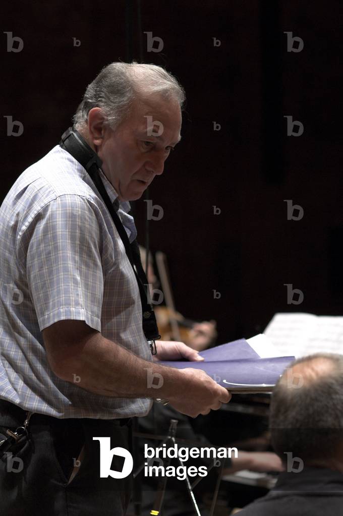 Northern Sinfonia orchestra manager arranges music sheets in Snape Maltings during the Aldeburgh Festival, 1 June 2005