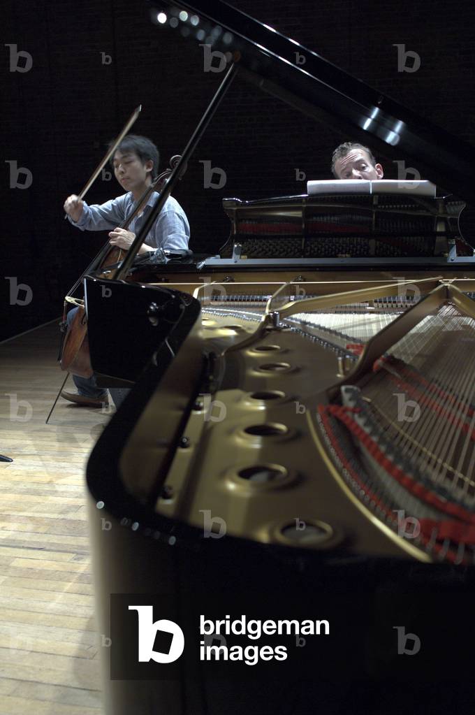 Li-Wei Young and Andrew West - portrait of the English pianist and Chinese cellist performing in Snape Maltings during the Aldeburgh Festival, June 2005