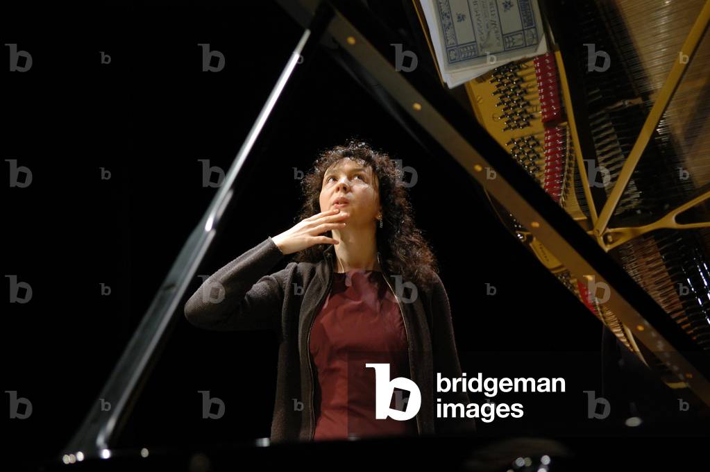 Luiza  Borac, standing next to a piano at the Aldeburgh Festival 2004