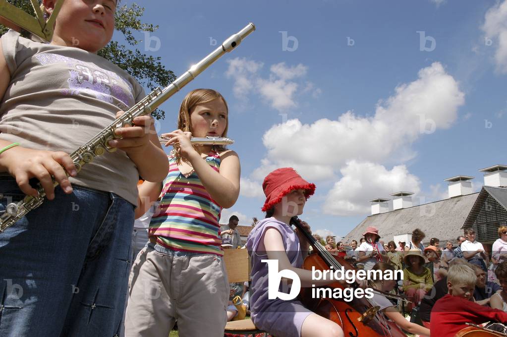 Fringe band at Snape Maltings, little girl playing the flute, part of Aldeburgh Festival 2004