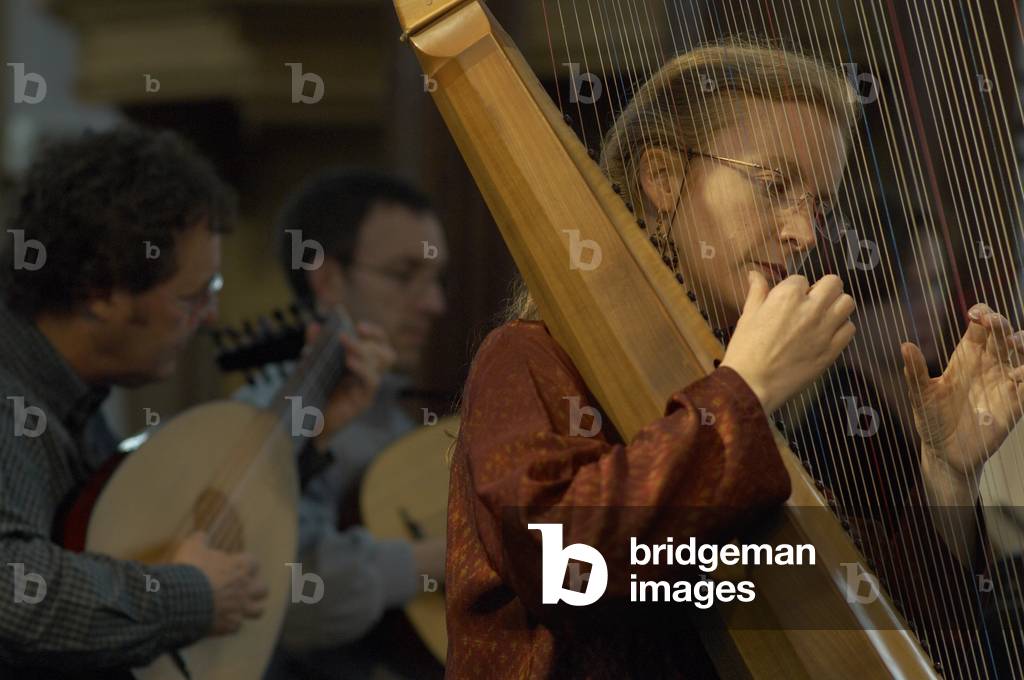 Siobhán Armstrong - portrait of the Irish harpist performing at the Blythburgh church, Suffolk, UK, June 2007