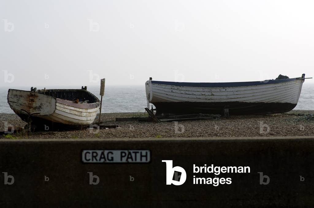 Aldeburgh - view of the sea with two rowing boats in the foreground in the town of Aldeburgh in the east of England, 15th October 2005