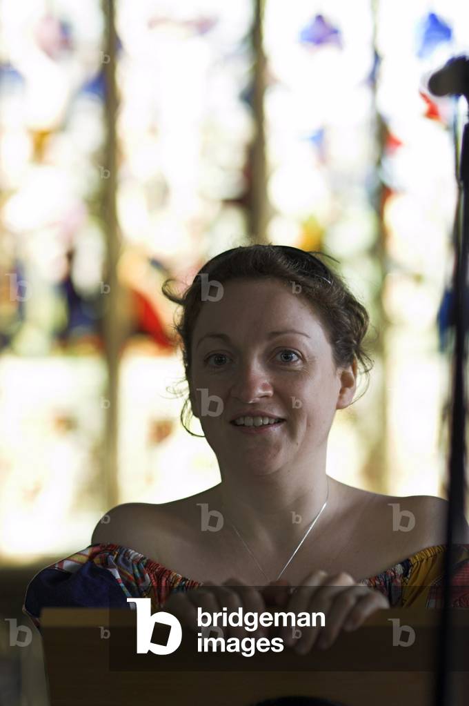 Ailish Tynan - portrait of the Irish soprano at Aldeburgh Parish Church in front of a stainded glass window during the Aldeburgh Festival, June 2005