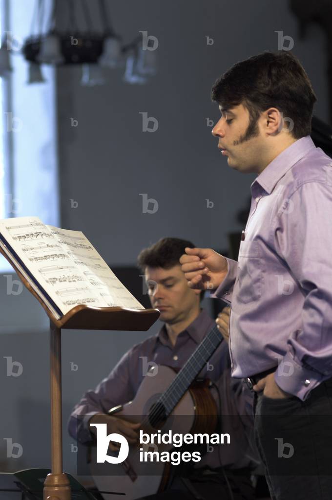 Craig Ogden and Mark Wilde - portrait of the Australian guitarist and Scottish tenor performing in Orford Church at the Aldeburgh Festival, 1 June 2005
