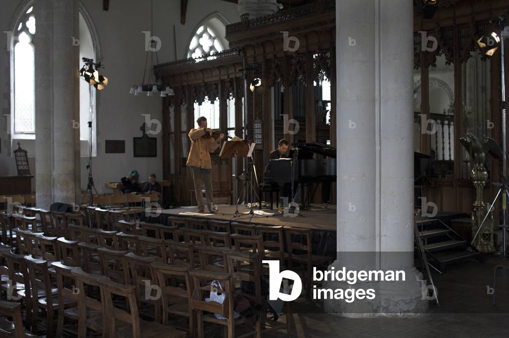 Anthony Marwood and Thomas Ades - portrait of the violinist and English composer and artistic director of the Aldeburgh festival in Orford Church during the Aldeburgh Festival, June 2005