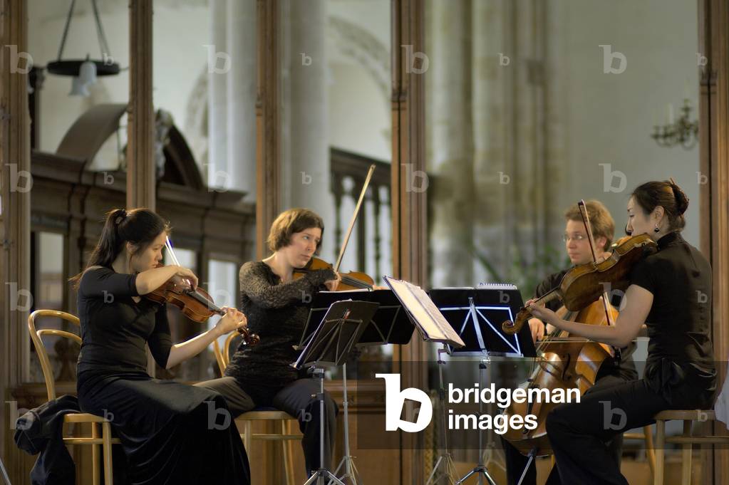 Alianza String Quartet - rehearsing with Sarita Kwok and Lauren Basney (violins),  Ah-Young Sung, (viola), Dmitri Atapine (cello) at the Orford Parish Church, Aldeburgh Festival, 2006