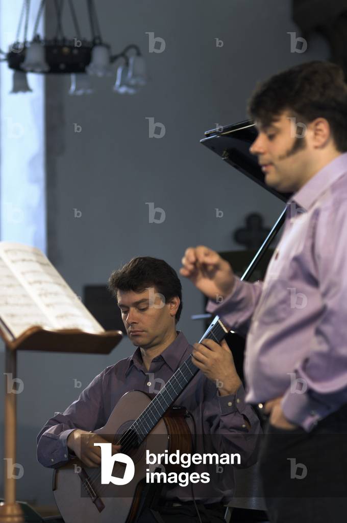 Craig Ogden and Mark Wilde - portrait of the Australian guitarist and Scottish tenor performing in Orford Church at the Aldeburgh Festival, 1 June 2005
