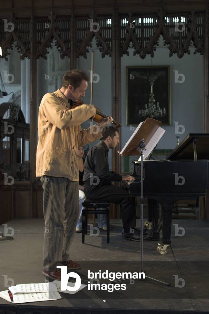 Anthony Marwood and Thomas Ades - portrait of the violinist and English composer and artistic director of the Aldeburgh festival in Orford Church during the Aldeburgh Festival, June 2005