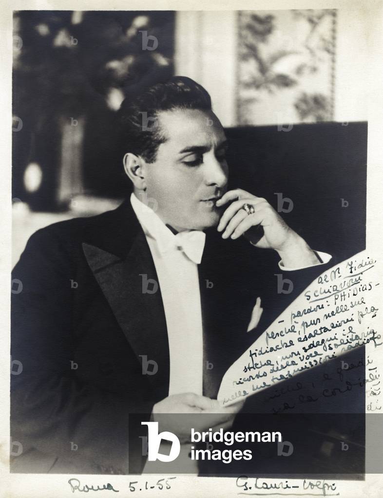 Giacomo Lauri-Volpi - signed portrait of the Italian tenor looking at a score