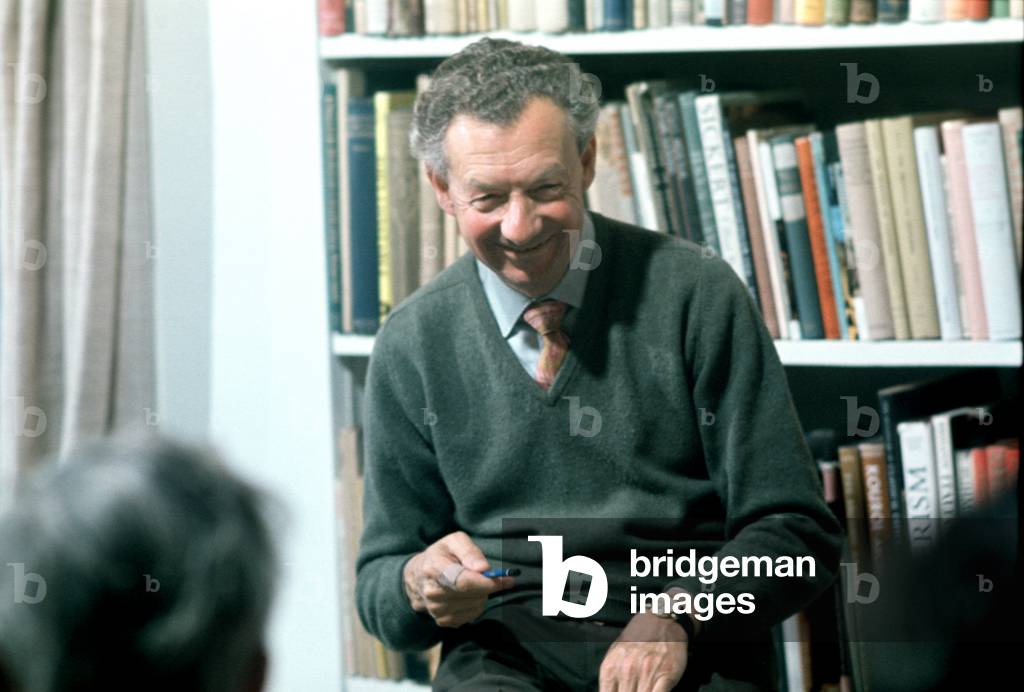 Benjamin Britten rehearses a choir in his home, the Red House, Aldeburgh (photo)
