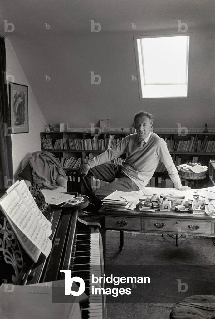 Benjamin Britten in his study at his home, the Red House, Aldeburgh, Suffolk, June 1964 (b/w photo)