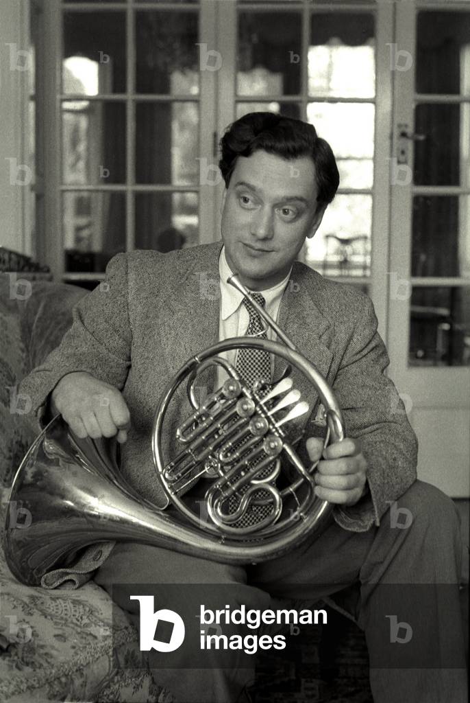 Dennis Brain  with horn at home, 1953.  (photo)