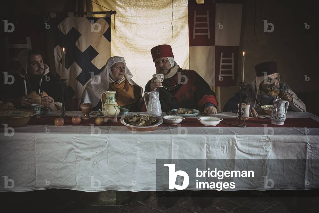 Hypothesis reconstructive military civil life under the Signoria of the Scaligeri, 14th century: The banquet of the nobles, Castle of San Martino della Vaneza, Fossona di Cervarese Santa Croce, Padua, Italy (photo)