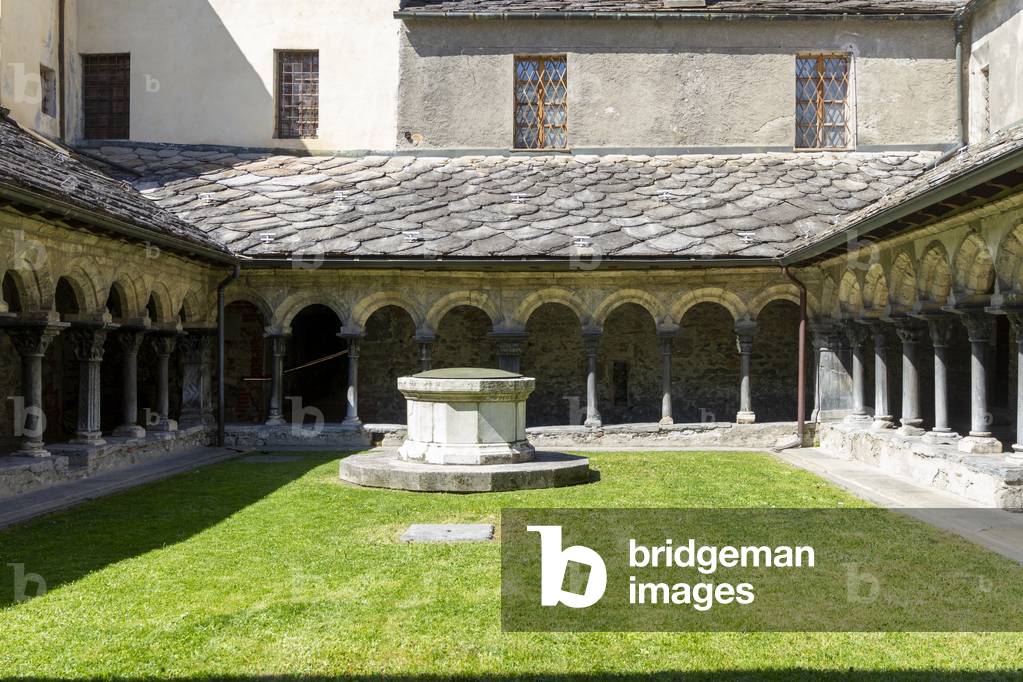 Cloister of the collegiate church of Sant'Orso, the cloister, with its round arches, its columns and the capitals, is an example of Lombardy-Catalan-Provençal Romanesque art, Aosta, Valle D'Aosta, Italy (photo)
