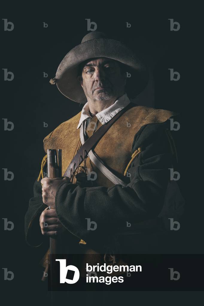 17th century, North Italy: country militia. Reconstructive hypothesis civil and military uses and customs. Portrait of archibugere, Verrua Savoia, Turin, Piedmont, Italy (photo)