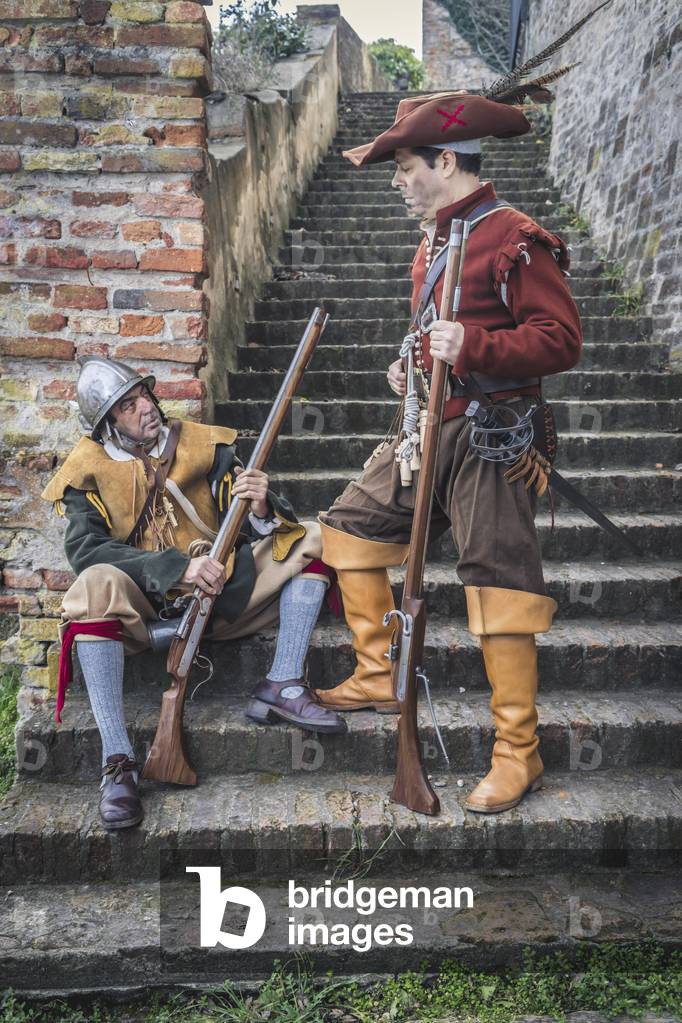 17th century, North Italy: country militia. Reconstructive hypothesis civil and military uses and customs. Portrait of archibugere, Verrua Savoia, Turin, Piedmont, Italy (photo)
