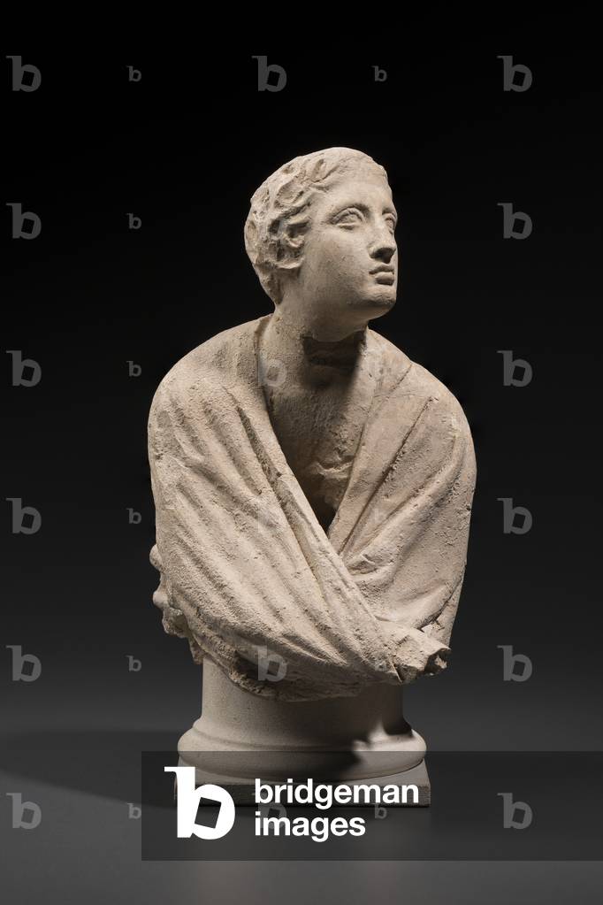 Fragmentary statuette of a youth (terracotta)