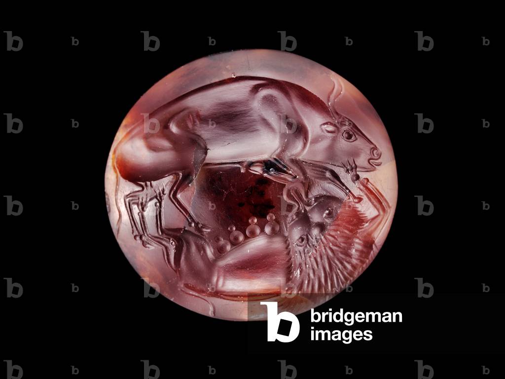Lens-shaped seal with lioness attacking a bull, Late Helladic II-III A Period, c.1600-1300 BC (carnelian)
