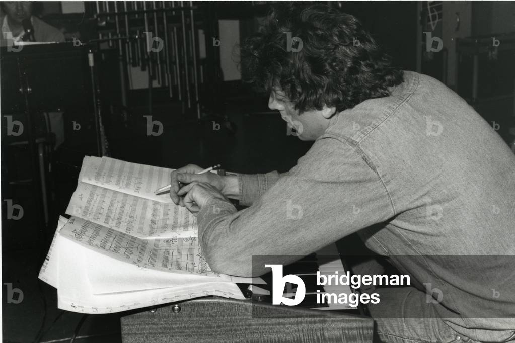 Philip Glass working, 1977 (photo)
