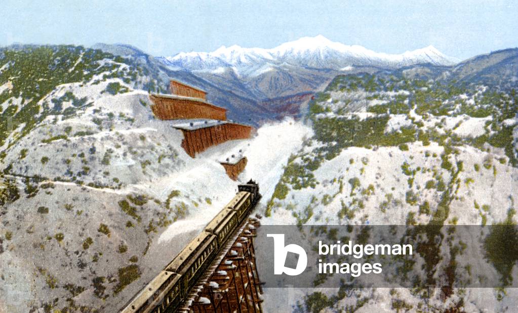train in a snowy canyon in California, postcard early 20th century