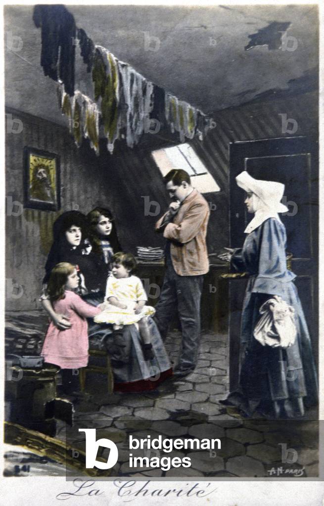 The charity : nun visiting poor people, c. 1910 (postcard)