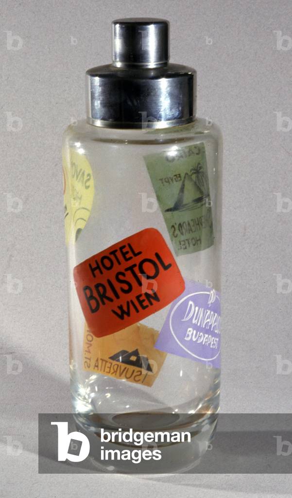 Shaker with hotels labels, ca 1920-30 (object)