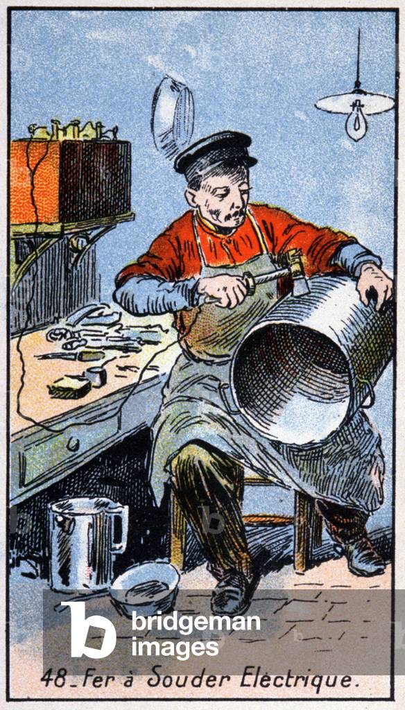 Electric soldering iron, early 20th century (illustration)
