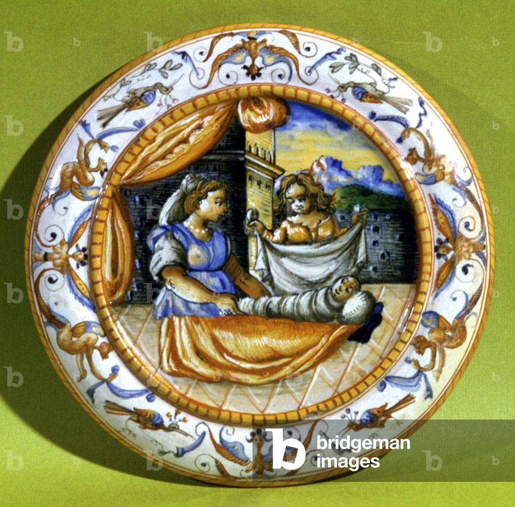 Women changing a baby, 16th century (earthenware)
